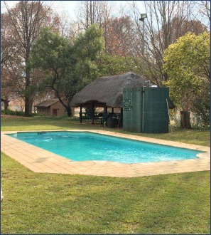 Berghaven pool with covered picnic area.